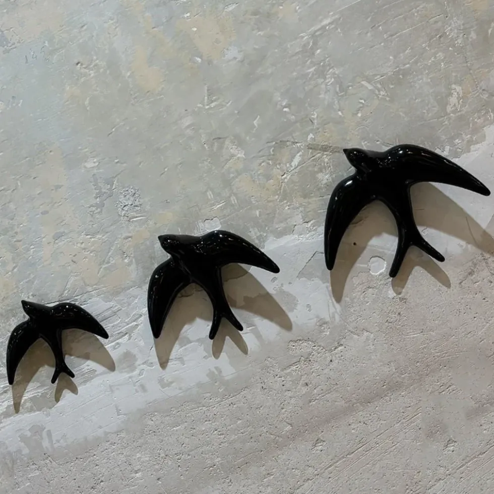 Trio of Black Swallows