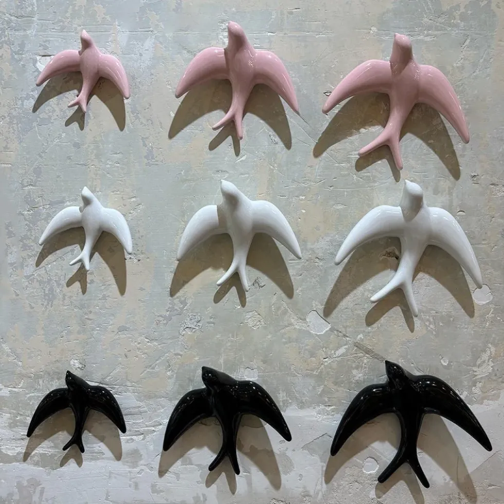Trio of Black Swallows