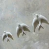 Trio of White Swallows