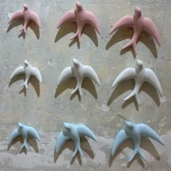 Trio of White Swallows